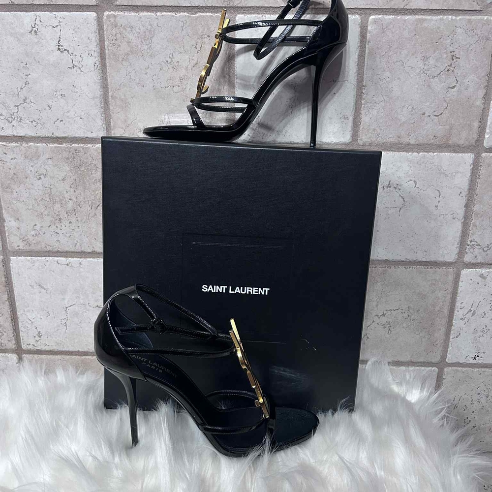 Yves Saint Laurent Black and Gold Heels